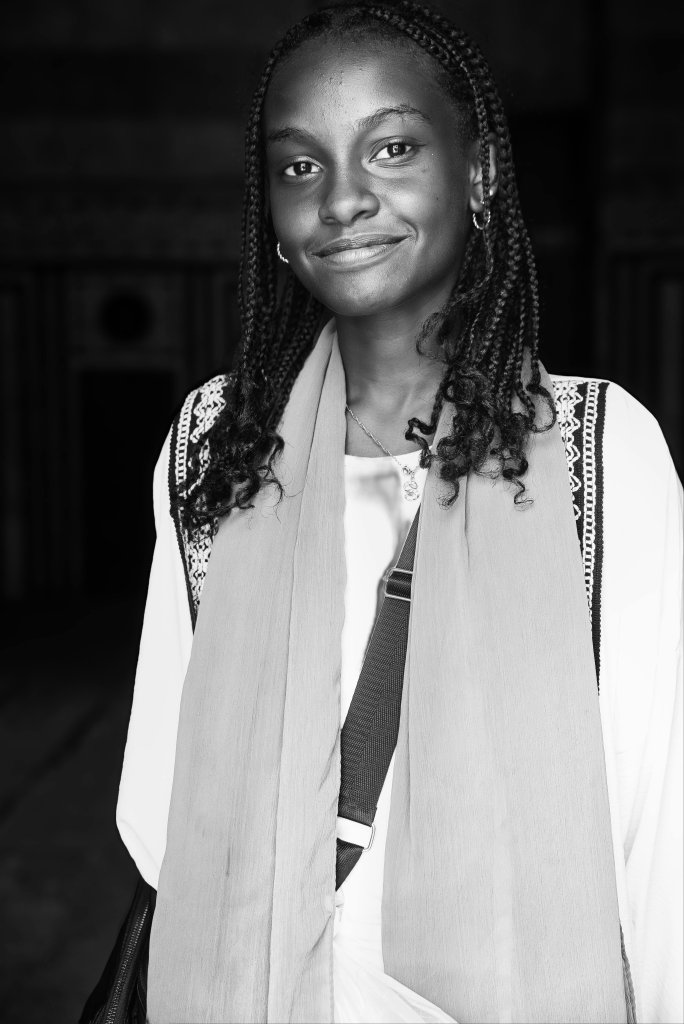 Black and white portrait of a smiling woman in Cairo, Egypt